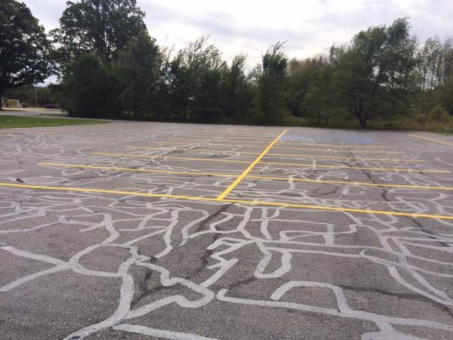 Repairing Asphalt - Crack Filling asphalt repair crack filling sealcoating manistee and benzie county michigan
